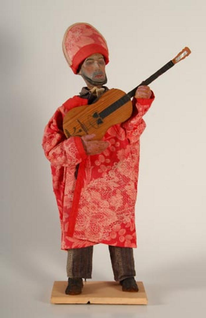 Folião com viola da terra