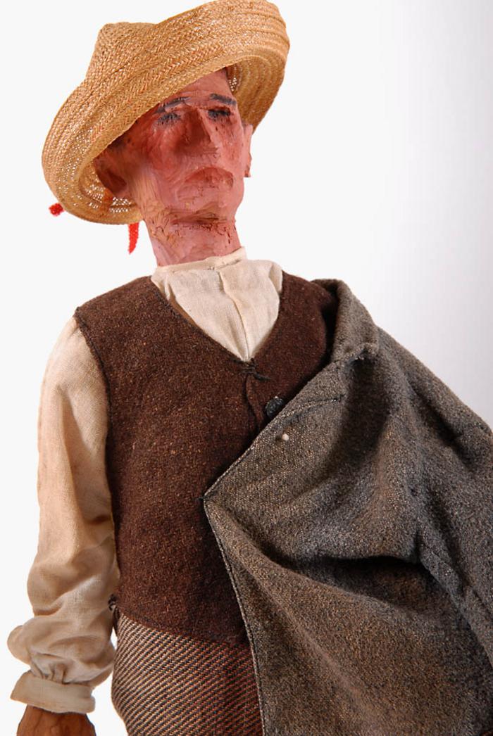 Homem que conduz burro